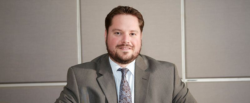 workers comp lawyer near auburn ny image of christopher stringham