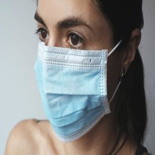 unemployment benefits due to coronavirus syracuse ny woman wearing face mask