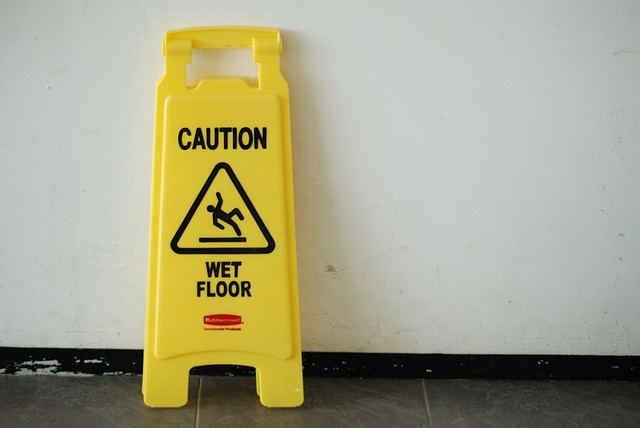 personal injury lawyers near watertown ny image of caution wet floor sign slip and fall lawyer