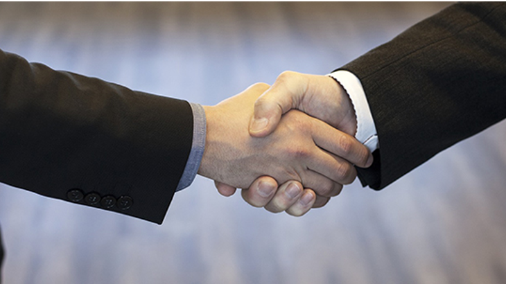 personal injury lawyers near watertown ny image of two men in suits shaking hands