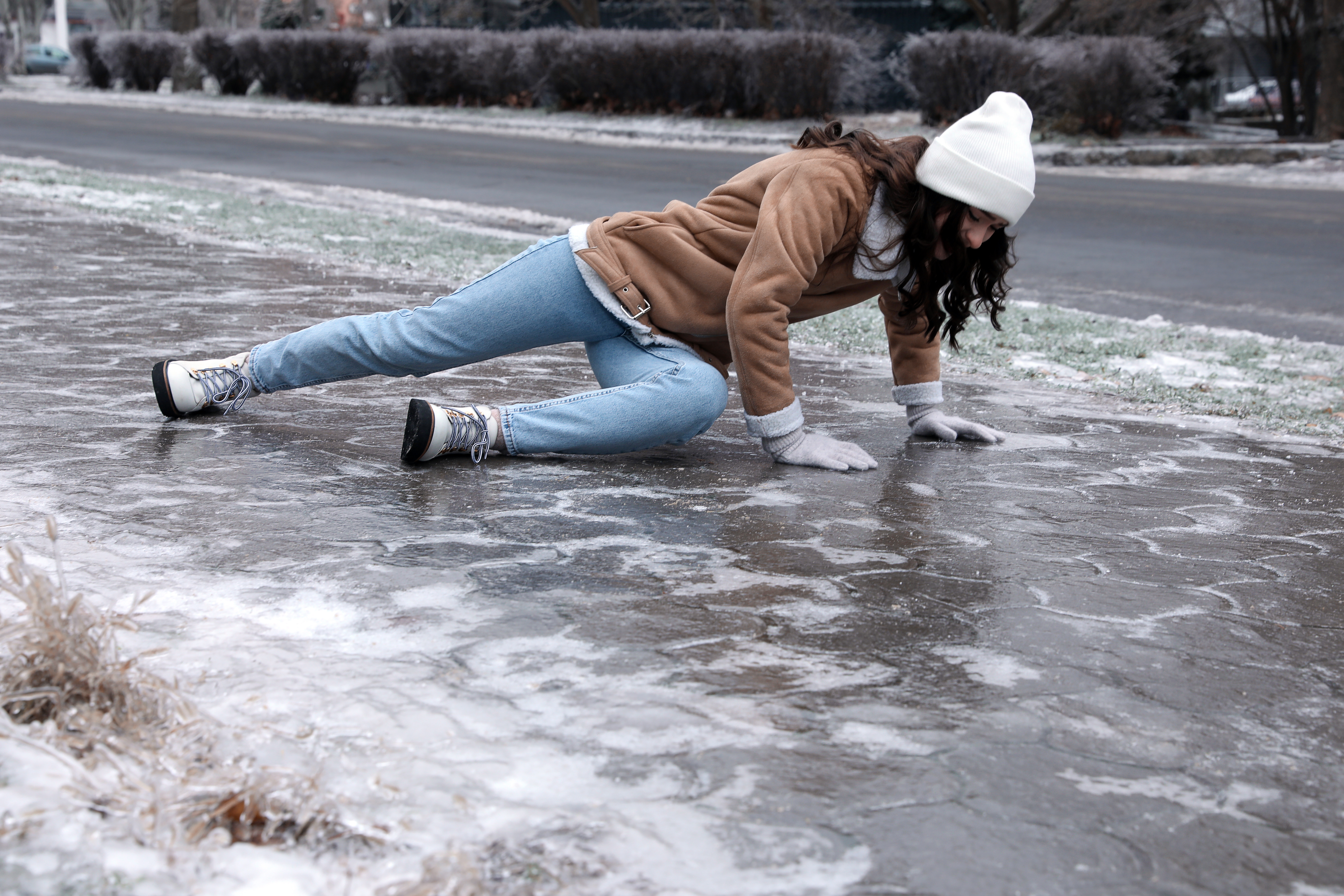 A woman slipping on ice