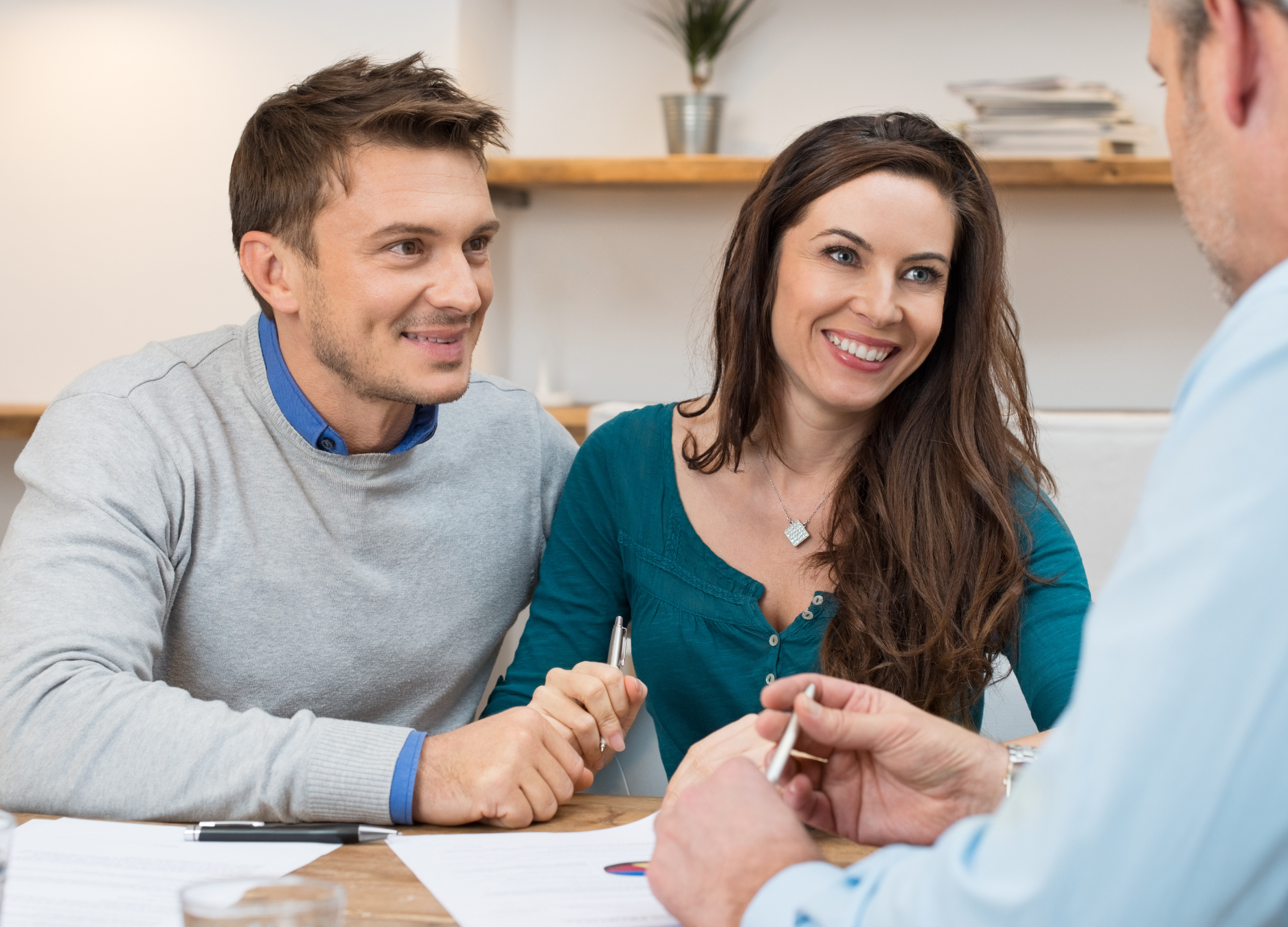 image of couple meeting with ny workers comp lawyers at mcv law