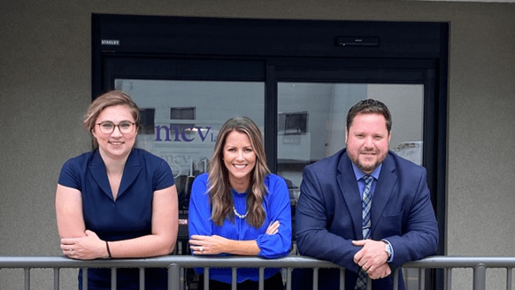 workers compensation lawyers near oneida ny mcv law workers comp attorneys posing and smiling in front of law office