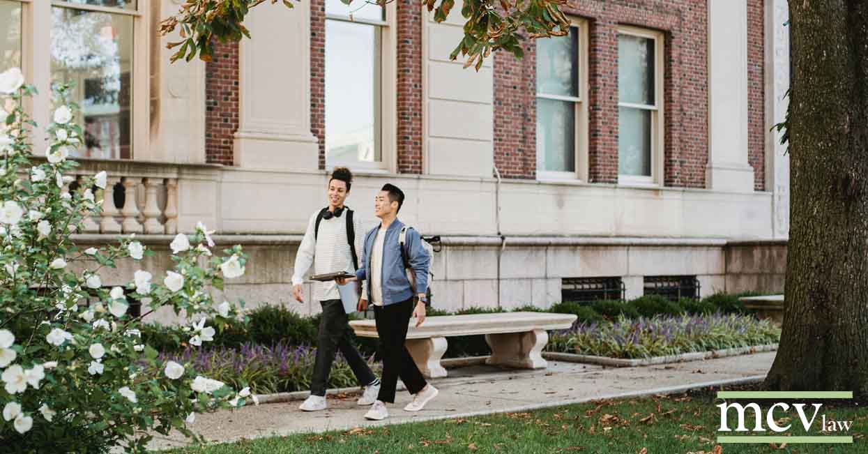 Two college students walking on campus