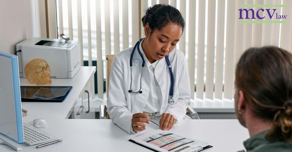 what medical evidence is needed for social security disability claims doctor looking over patient paperwork
