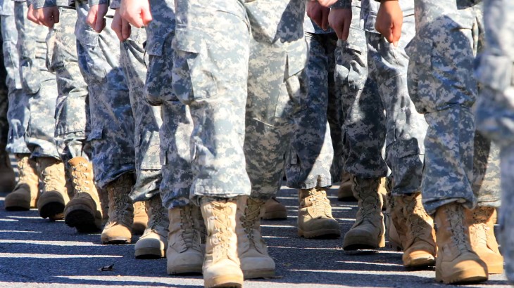 veterans disability lawyer near syracuse ny and watertown ny practice area image of military walking outside from mcv law